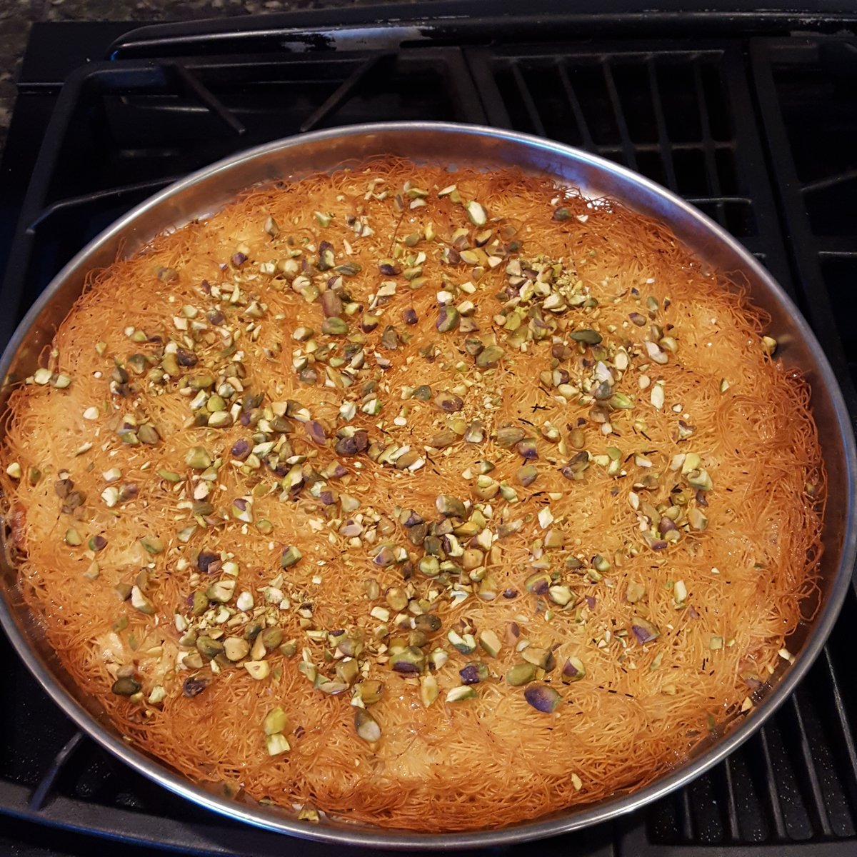 acraftyarab's tweet photo. I love love love having dinner in a Palestinian home, as I always know what comes at the end.
#kanafa https://t.co/47p2Kasrgu
