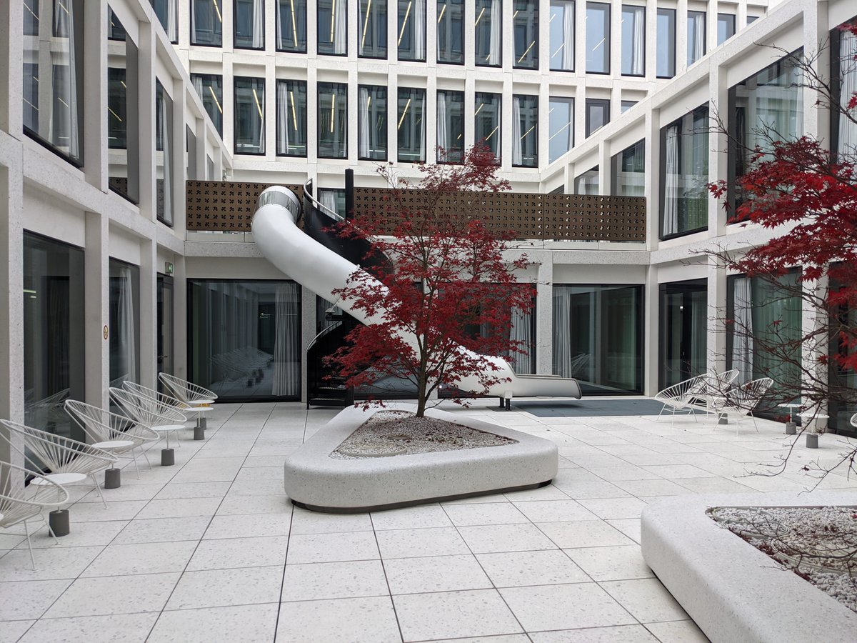 rustybrick's tweet photo. Google new outdoor area goes white for the holidays with easy slide entry access from the second floor https://t.co/NKB8Wnp30S via @g33konaut https://t.co/wmJT93aAJ3
