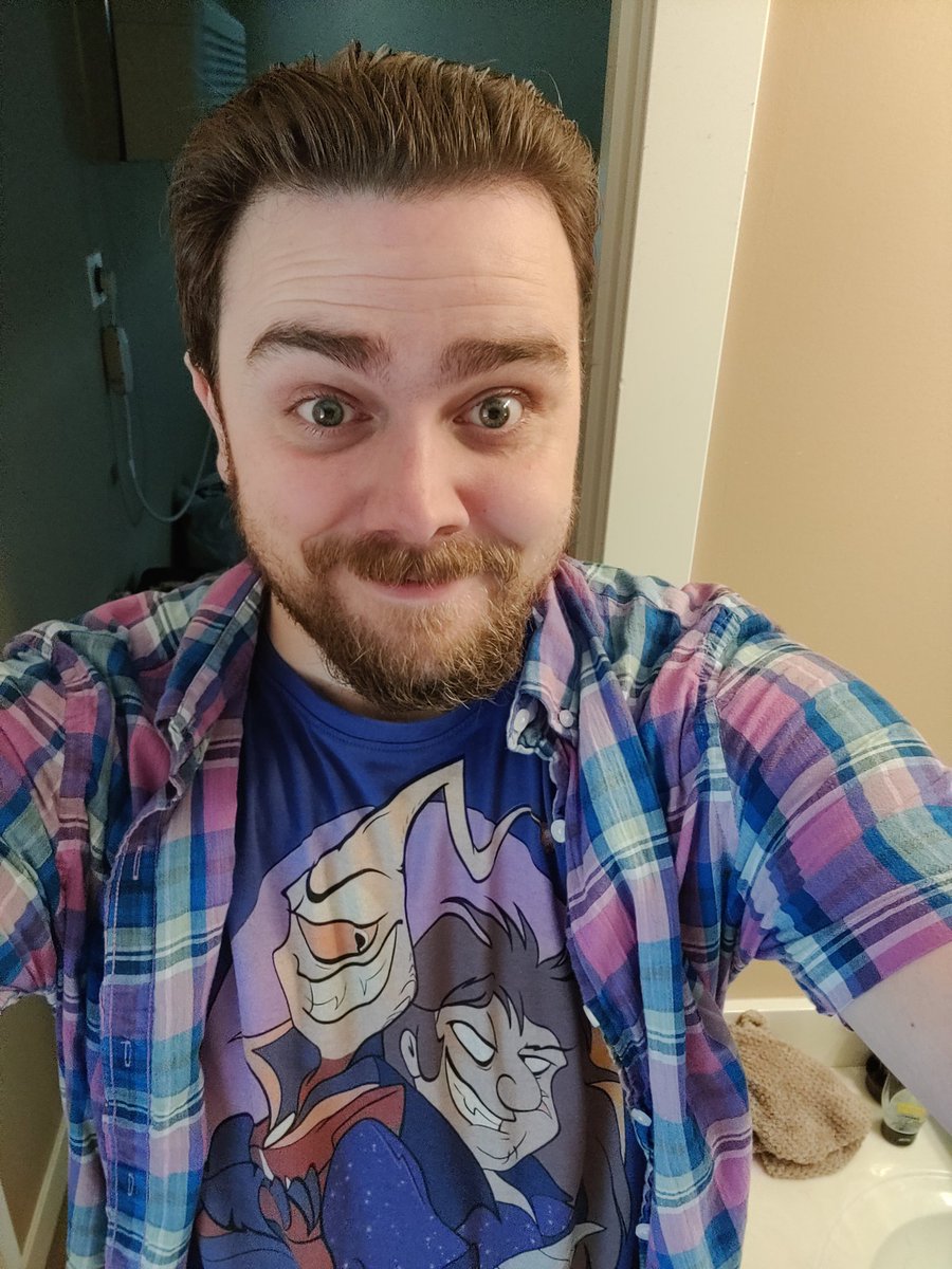WileyTheKoyote's tweet photo. Currently rocking this shirt today, drawn by @Miss_Snowkitty, featuring two of my bois, Kaarza and Ricky from  @Villains_Co, made by @Magpie_Feather. 

So blessed to know such amazing, beautiful people. 🙏💖 https://t.co/U2Xhlhd2TG