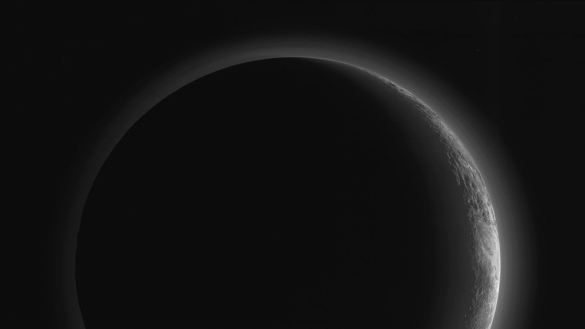SETIInstitute's tweet photo. #PPOD: As @NASANewHorizons sped past #Pluto, it looked back and took this silhouetted shot. Along with newly processed images that provide a dim peek at the planet’s dark side, the images revealed details of Pluto's hazy nitrogen atmosphere. 

Credit: @NASA @JHUAPL @SwRI https://t.co/eXWRSZ2FgS