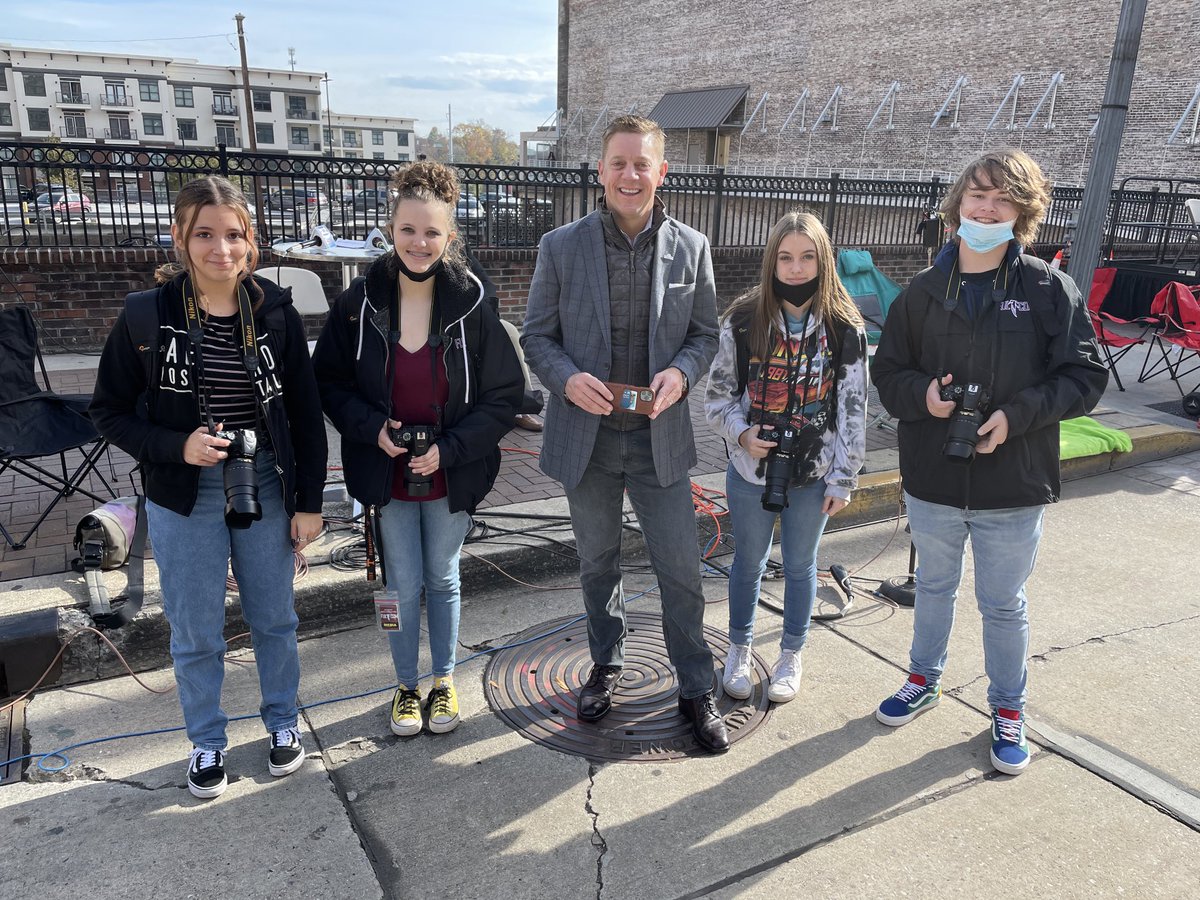 Fulton student photographers pause with ⁦<a href="/JohnBeckerWBIR/">John Becker</a>⁩ prior to the start of the Veterans Day parade in downtown Knoxville. ⁦Fulton communication students are on-site covering the parade for for FulCom media.