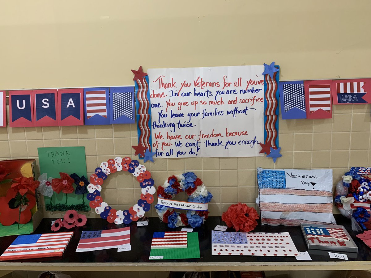 SPSprincipal's tweet photo. Honoring veterans throughout our building @StPeterSchool https://t.co/EOrwSTuagI