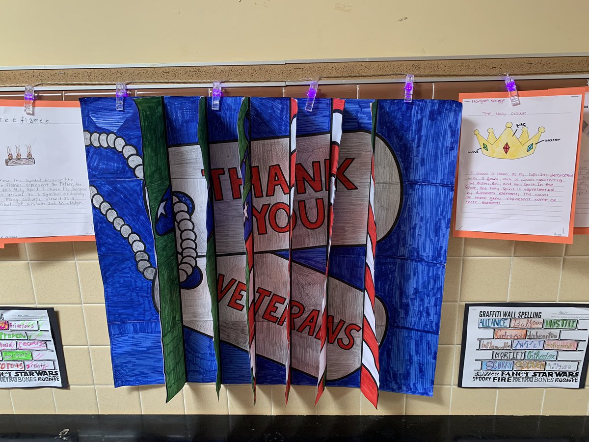 SPSprincipal's tweet photo. Honoring veterans throughout our building @StPeterSchool https://t.co/l45jeh6Dv1