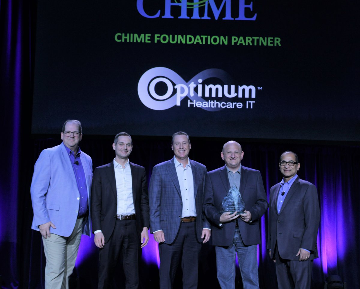 OptimumHIT's tweet photo. Flashback to @CIOCHIME #chime21fall when @OptimumHIT received the 2021 Foundation Partner of the Year Award. Left to right: @CHIMECEO, Geoff Blanding, Brian Symonds, @larrykaiser, and @CIOShafiq. #healthcare #healthcareit #CIO https://t.co/dLqF37n7h0