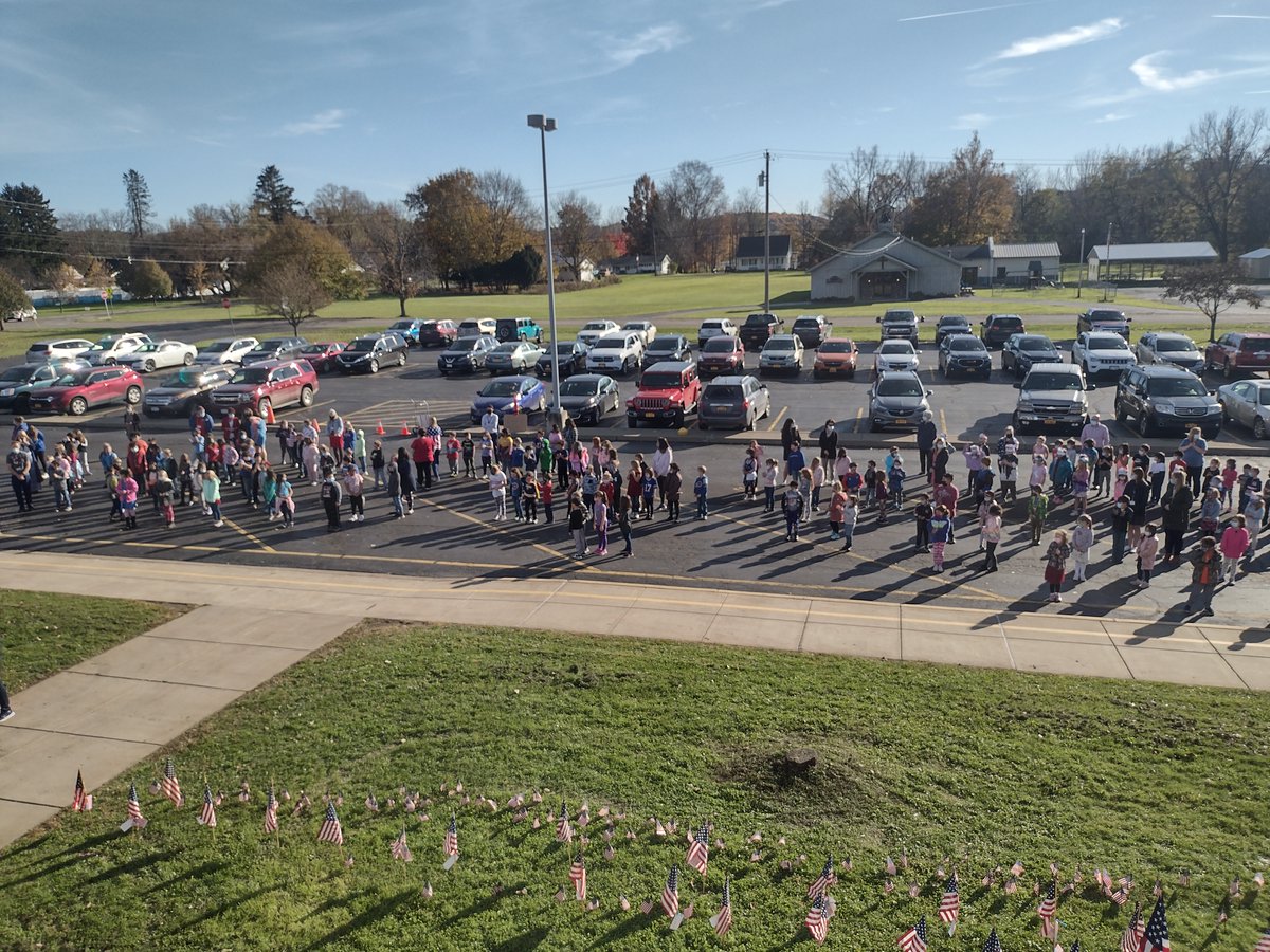 GowandaCSD's tweet photo. Students places American flags on the lawn of Gowanda Elementary School in observance of Veterans Day 2021 before assembling in the parking lot to sing "Thank you, Soldiers." 🇺🇸❤️🤍💙

#PantherPride #GowandaCSD #VeteransDay2021 

@CarrieDzierba @TheObserverNY @WDOEnews @NYSEDNews https://t.co/f8YtAsvJnr