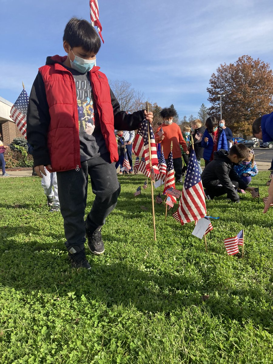 GowandaCSD's tweet photo. Students places American flags on the lawn of Gowanda Elementary School in observance of Veterans Day 2021 before assembling in the parking lot to sing "Thank you, Soldiers." 🇺🇸❤️🤍💙

#PantherPride #GowandaCSD #VeteransDay2021 

@CarrieDzierba @TheObserverNY @WDOEnews @NYSEDNews https://t.co/f8YtAsvJnr