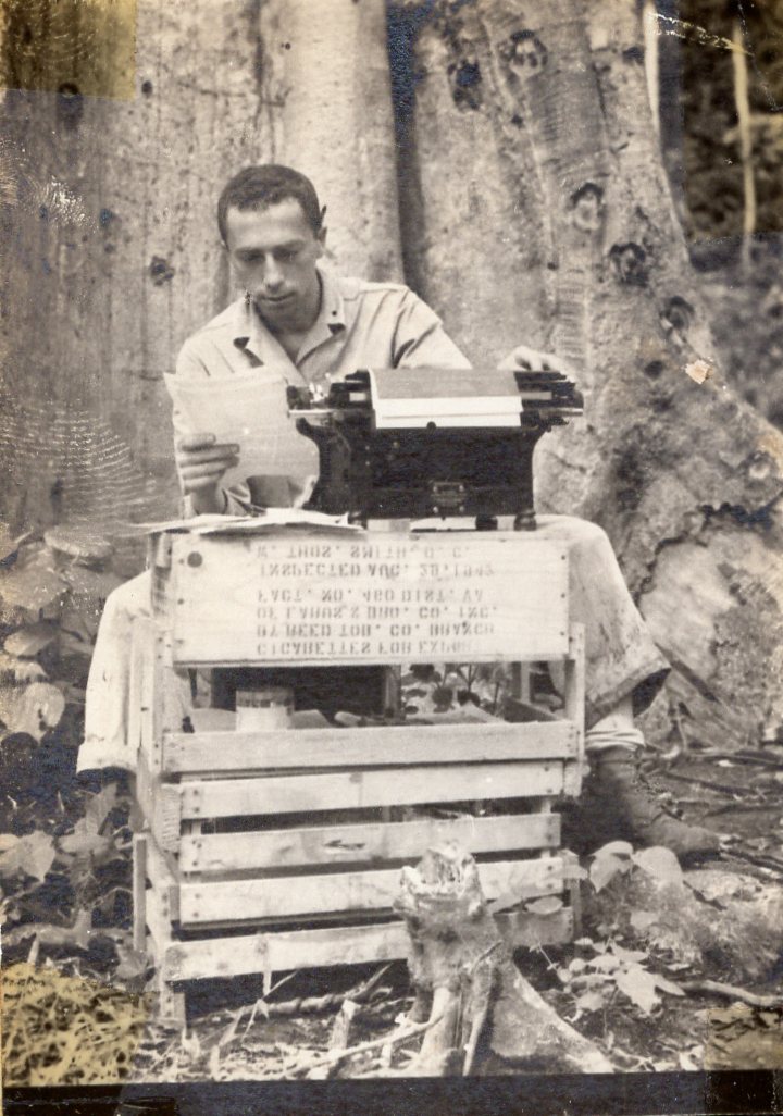 For Veterans Day: My dad, circa 1943, with pencil behind his ear at a makeshift desk in the Solomon Islands. He spent four full years in the South Pacific.