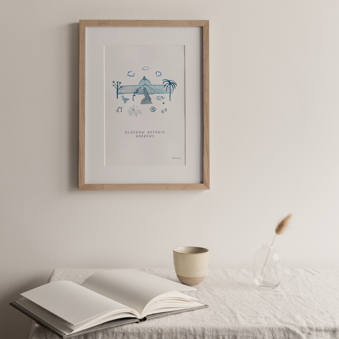 Glasgow Botanic Gardens.
This design features the Palm House, which was built in 1834, just over a decade after the Botanics had moved from its previous home on Leith Walk. The marble statue featured is of Eve.

The artwork was formed using hand-painted blue inks and forms part o