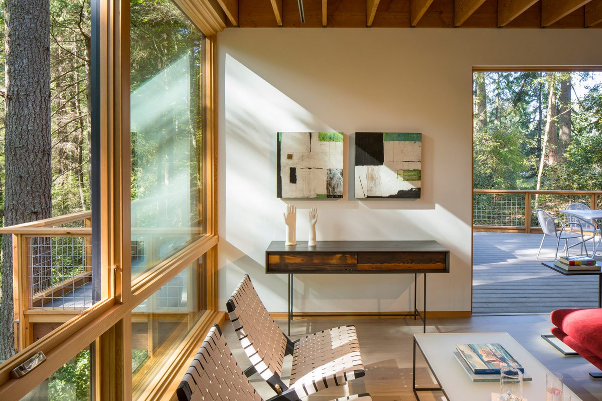dezeen's tweet photo. Corten steel clads Little House/Big Shed in Washington by @DVDVNGLN: https://t.co/LLe9e41rLv https://t.co/OtxU3ihnyv