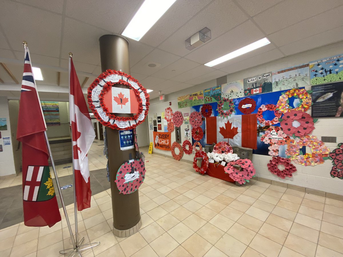 HewittsCreek's tweet photo. Our foyer is looking beautiful! Each class created a wreath and brought it down during our virtual assembly. #HurricanesFly #scdsb #WeRemember https://t.co/ordaVyXBtV