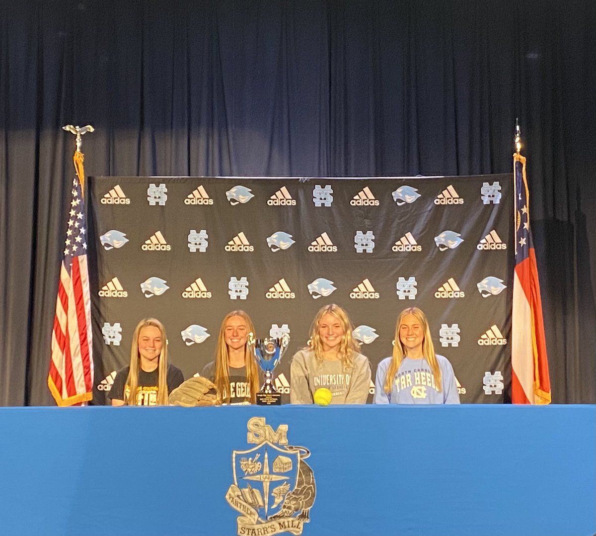 SMHSFastpitch's tweet photo. Congratulations to 4 Lady Panthers on signing their NLI today to continue their softball careers! So proud of you!#NextLevelPanthers
@lillibackes - @UNCSoftball 
@sydblair22 - @UNGSoftball 
@JuliaCliff2 - @_GSWSoftball 
@sarahlathammm - @mga_softball https://t.co/9hU2XNRky5
