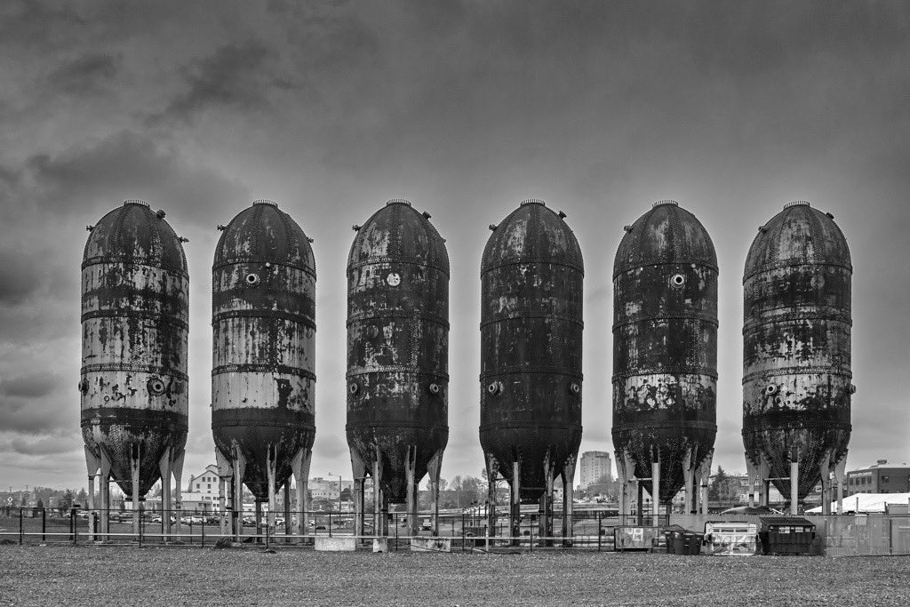 Six Digester Tanks. Bellingham, Washington. (Sigma DP1 Merrill.) #digestertanks #bellinghamwashington #sigmadpmerrill #sigmadp1merrill #foveonsensor #industrialdesign #industrialarchitecture #industrialphotography #monochromephotography #blackandwhitephotography #sigmacamera