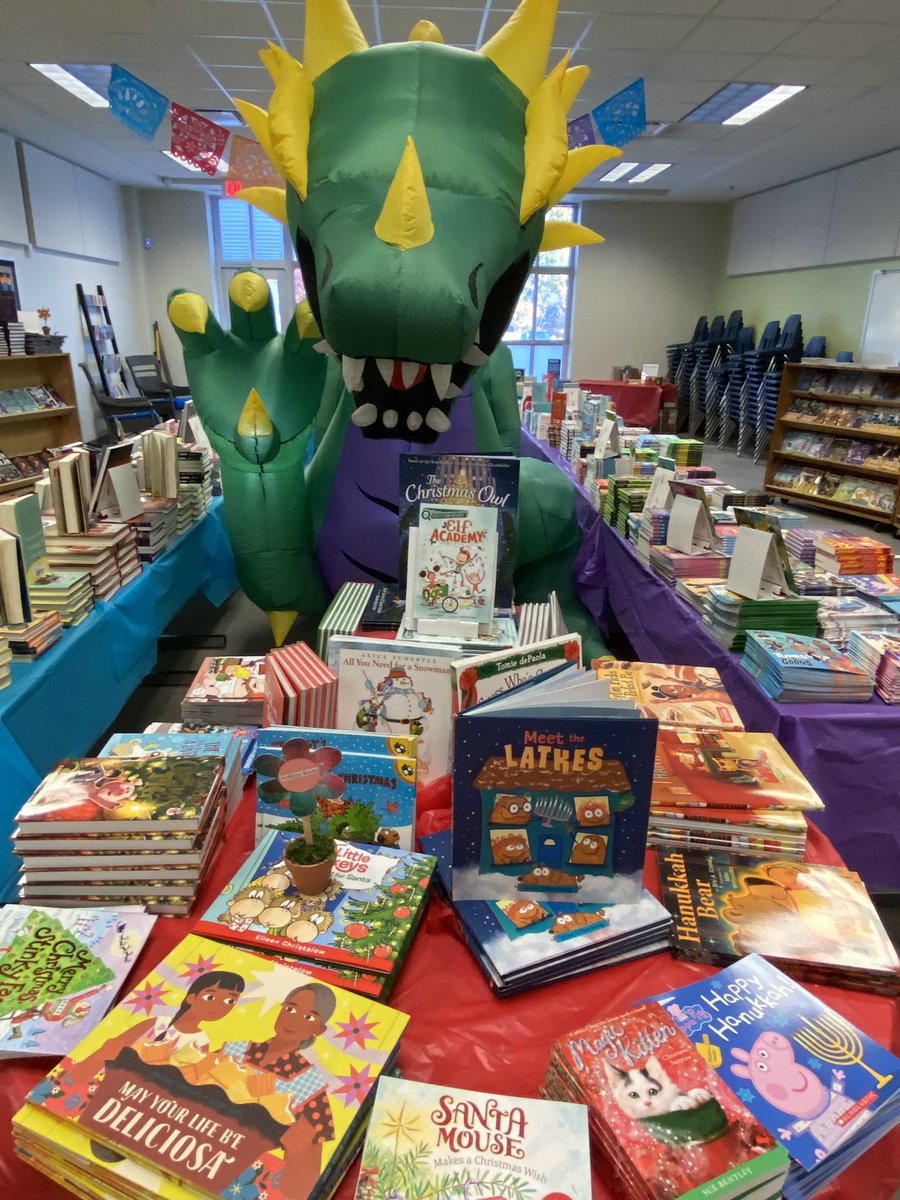 BowsherKimberly's tweet photo. Book Fair started today. 
📚🐉❤️
Parent volunteers did an excellent job with the theme.
#RiversElementary #APS #Books #Reading 
@riverslionsroar @JohnWallerEdD @melsithole @apsupdate @dan_a_sims @DrLisaHerring https://t.co/bmJ1k8T5D1