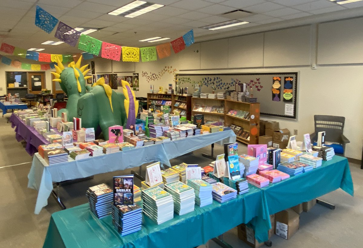 BowsherKimberly's tweet photo. Book Fair started today. 
📚🐉❤️
Parent volunteers did an excellent job with the theme.
#RiversElementary #APS #Books #Reading 
@riverslionsroar @JohnWallerEdD @melsithole @apsupdate @dan_a_sims @DrLisaHerring https://t.co/bmJ1k8T5D1