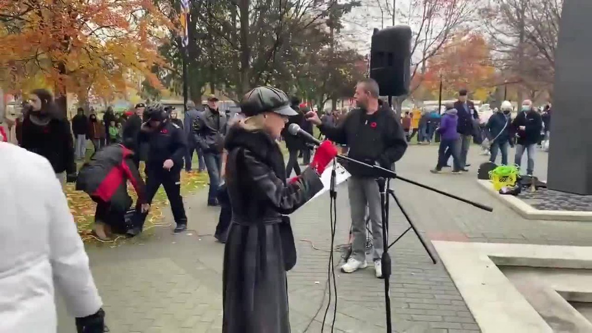 CityNewsVAN's tweet photo. "It's not about you!" shouted one outraged person in #Kelowna after anti-vaxxers disrupted a Remembrance Day event.

One witness says people were visibly upset by the event, some even brought to tears. https://t.co/3OV3sdwQJb https://t.co/F2s1pCjAFf