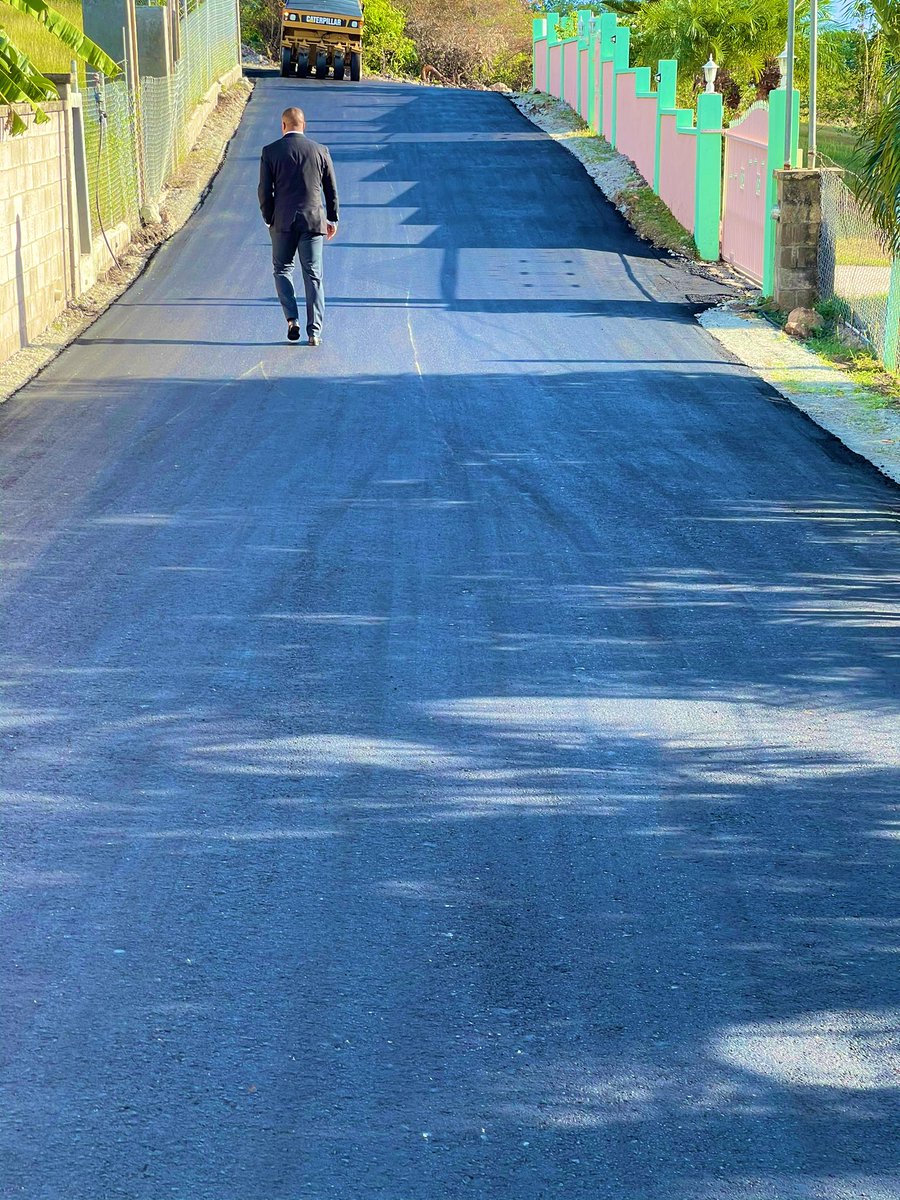 markbrantley3's tweet photo. #PeopleMatterMost #ConstituencyMatters Happy to walk a new road done by Public Works with our brand new state of the art paving machine. The road had become a river bed and the residents in the area had cried out for some time. Tonight I know they will be much happier. https://t.co/az3fYwvNjD