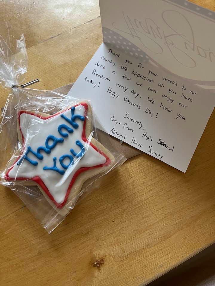 NhsCary's tweet photo. We are thankful to all veterans for their service to our country.  NHS members shared their gratitude by visiting the homes of 65 local veterans with a small gift, and mailed thank you notes to veterans who live a bit further. 🇺🇸@CaryGroveHS @kveldyCG  @NeilLesinski #WeBeCG https://t.co/IZ1aHqHq1m