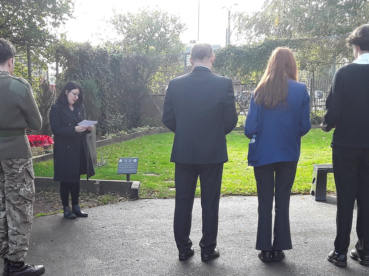 WisemanEaling's tweet photo. At 11:00 am today to mark #ArmisticeDay  we stood to listen to an address by Ms Quigley in #Remembrance of all those who lost their lives serving their country.  During the #TwoMinuteSilence   wreaths were laid in our Memorial Garden dedicated to Lance Sergeant #Chris Casey (IG) https://t.co/j3gGD35b7C