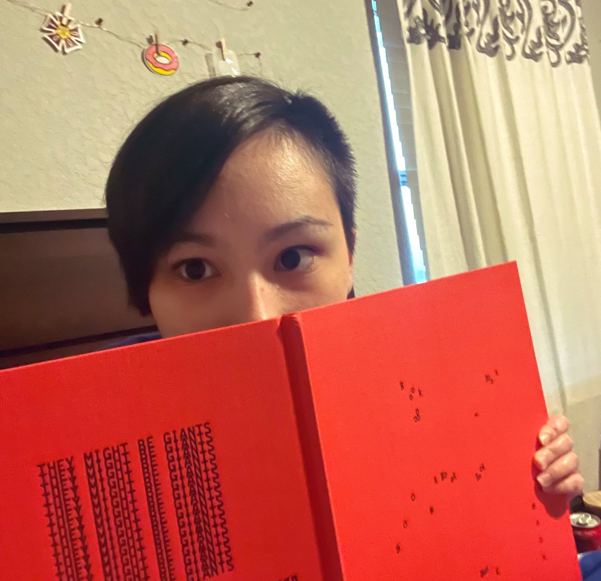 ecnaIubma's tweet photo. // #lookingoverBOOK because im really glad i have this and also i get to do a half face reveal :) love u @tmbg https://t.co/PBa7ZlUcKO