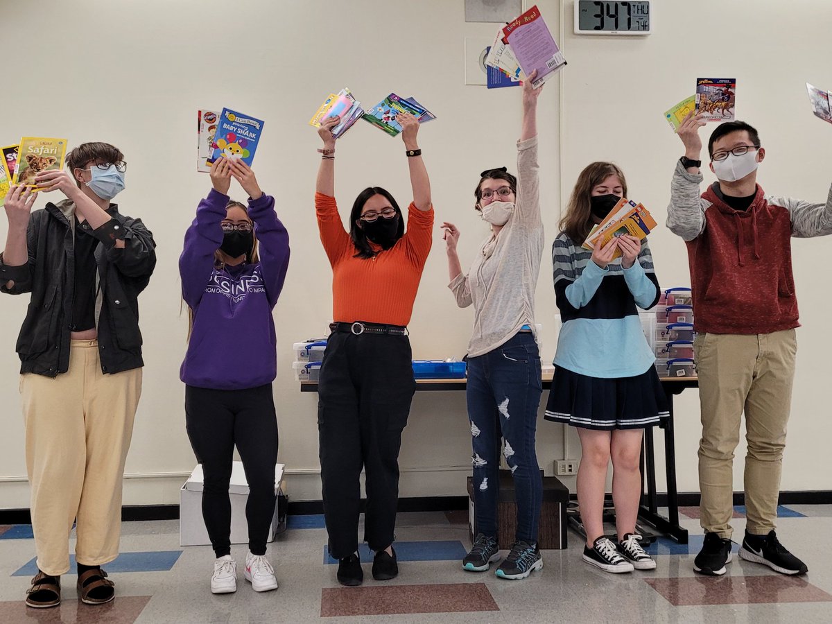 REDBookshelfOrg's tweet photo. What a day! First we got to work with out partners at @wwaarc who worked to mend and label more than 200 books! Then we had an afternoon with our friends at the @ualbanynewman association who helped prepare MORE booms for RED Bookshelves. Albany families, we got you! https://t.co/yVrvd3IXdQ