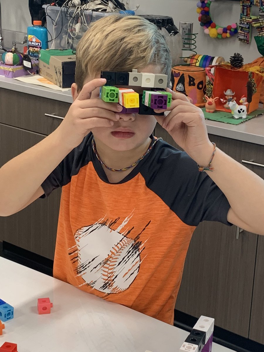 Each month kindergarteners spend time playing at 6 different centers. These snap cubes are their new favorite!! This boy is an innovative designer. He could be our next  genius designing new technologies on our future!! STEM play is crucial!!

What did he make? #proudarrows