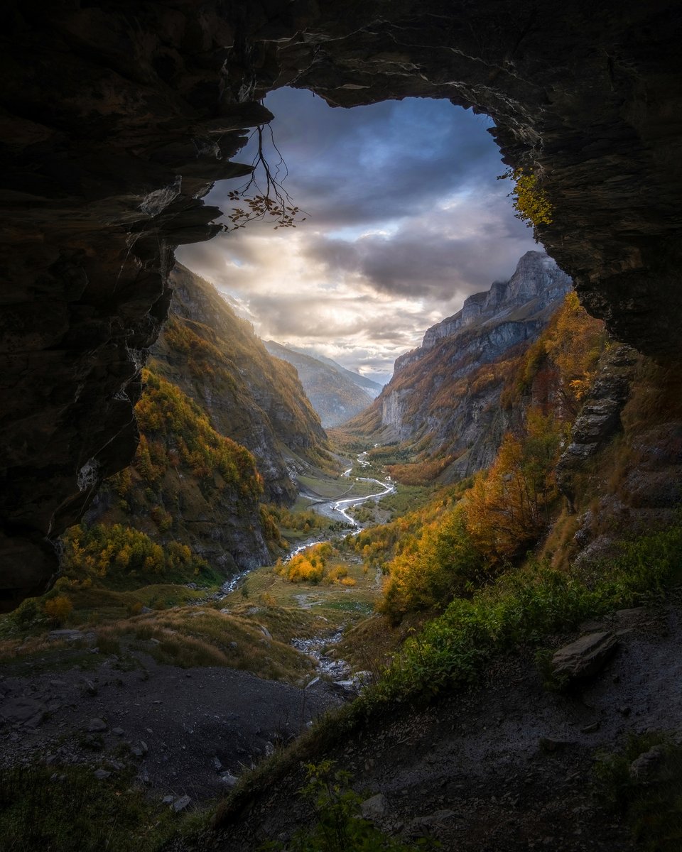 A cave overlooking a beautiful valley in the French Alps 🇫🇷