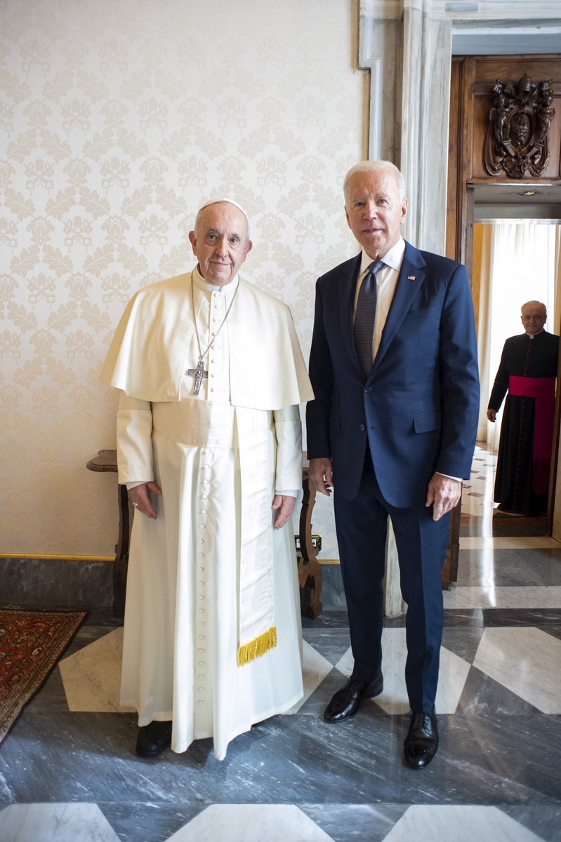 On arrival: blue suit
After #Shartweek
Black Suit
 #PoopyPantsBiden
#PoopGate
