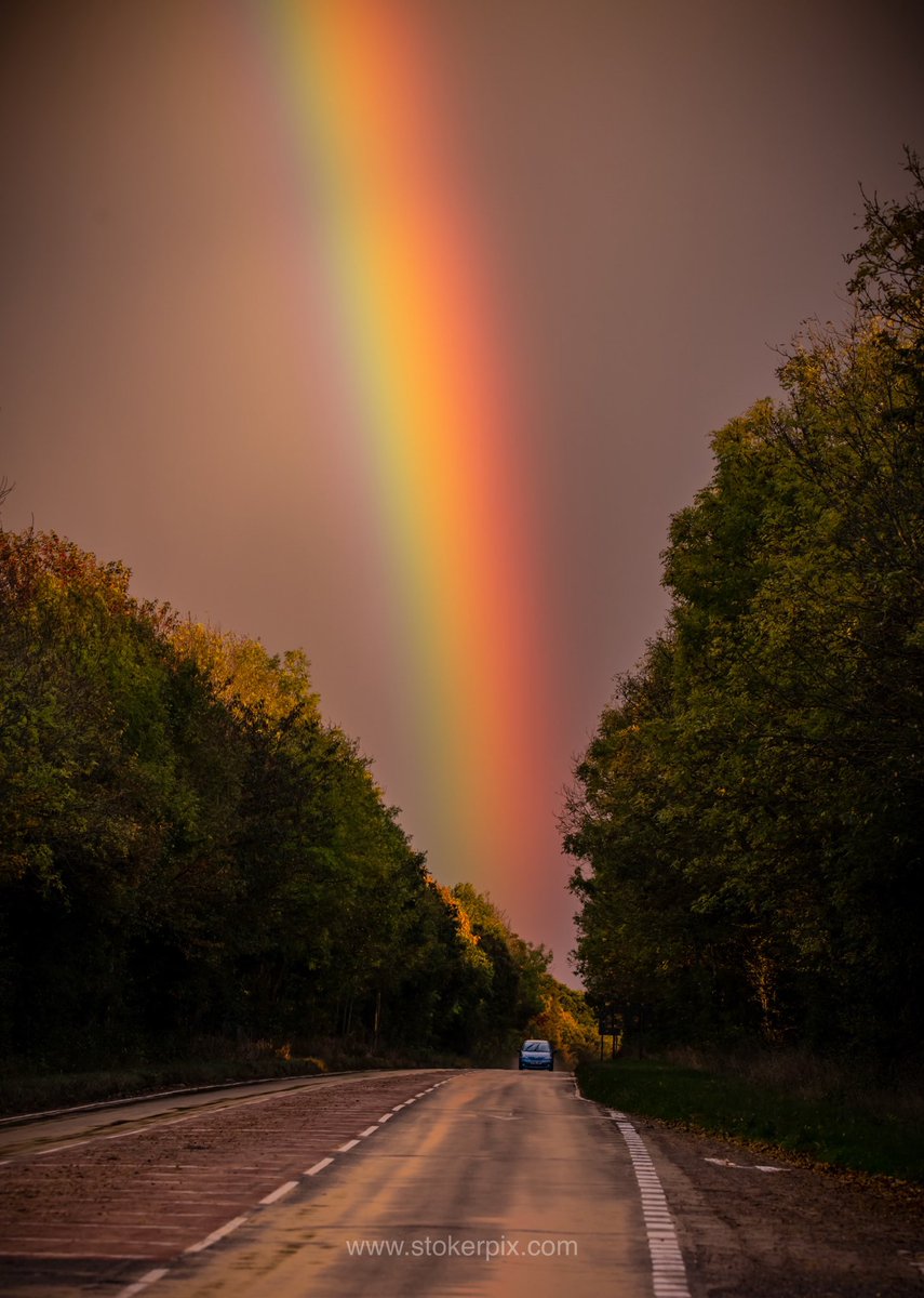 “rainbow down” stormy weather  and sunshine presented me with this image in my rear view mirror so I just had to pull over and photograph it #rainbow #Autumn #potofgold