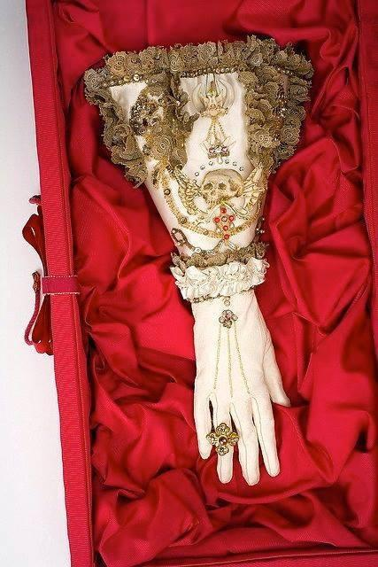 IsabellaRosner's tweet photo. Happy Halloween! I'm celebrating with my favourite pieces of historic memento mori needlework: a 17th-century Dutch needlework picture (with "today for me tomorrow for you" in Latin), a 16th-century glove, and an undated chasuble (maybe 18th century?). Spooky skeletons for all! https://t.co/b2XWhaBnUm