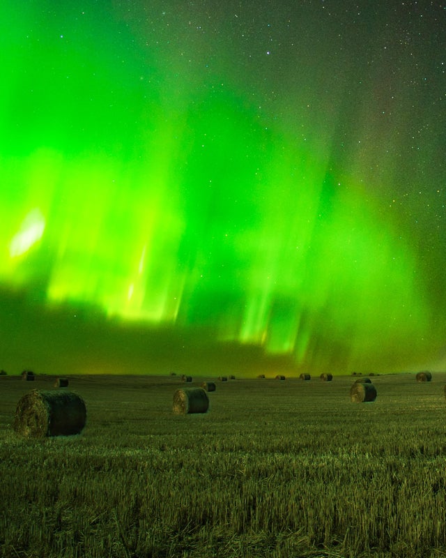 "Aurora Borealis light up the night sky over North Dakota fields"