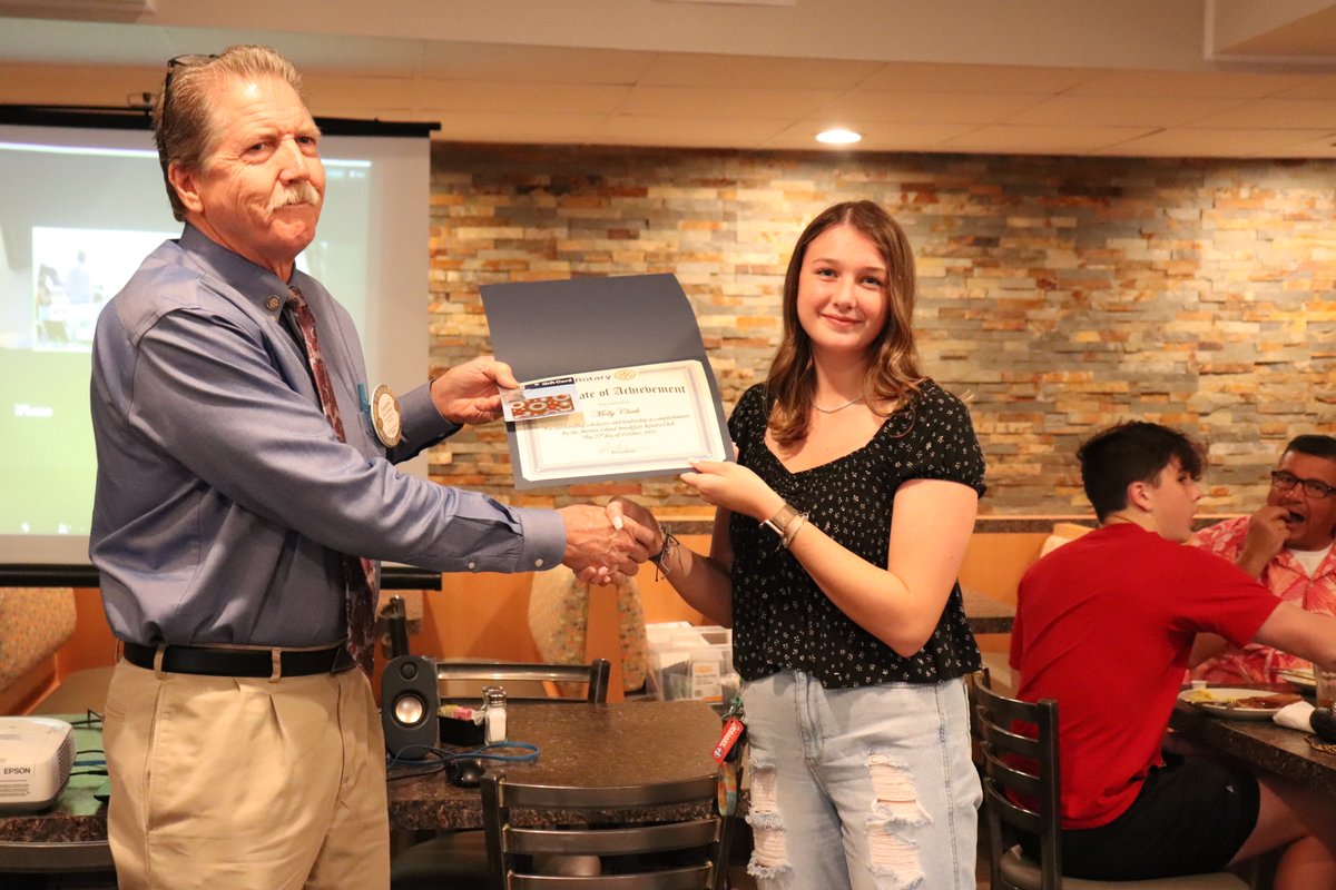 mibrotary's tweet photo. Molly Clark : Club Student of the Month for Oct 2021 Acting President Jason presented Molly with a Certificate, a gift card for “Books A Million” and a plaque to be placed at Edgewood Jr./Sr. High School cafeteria.  @BrevardSchools @Rotary https://t.co/h2dg4YFCzc