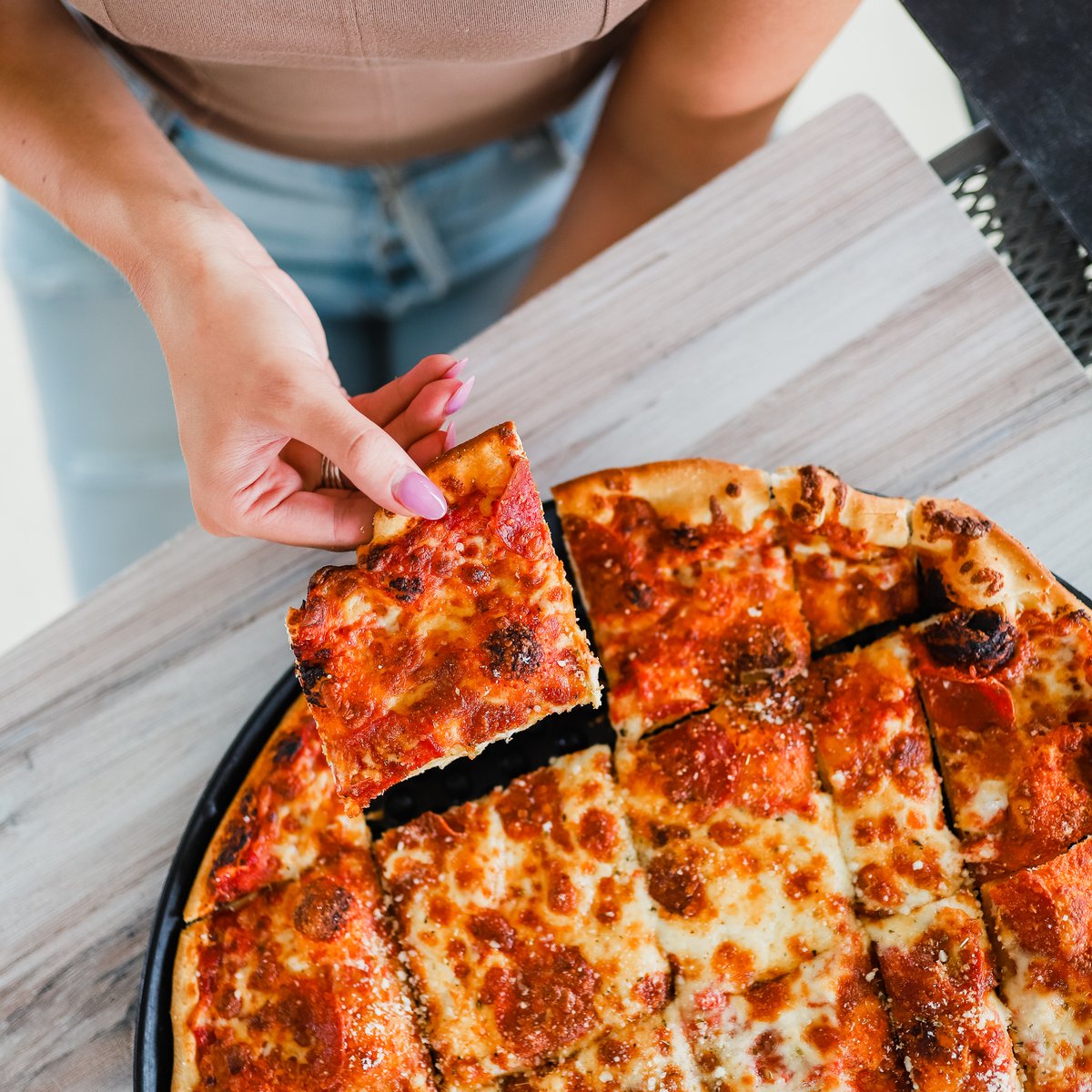 rosatisatl's tweet photo. POV: You're on the patio, reaching in for a slice of Rosati's Chicago Deep Dish with the Falcons playing overhead. 🍕🏈 Sounds like a perfect Sunday if you ask us! 😁 #RosatisATL https://t.co/9FJLzTkwF2