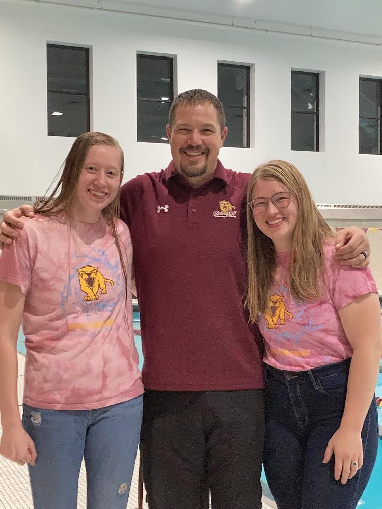 UMMSwimDive's tweet photo. Yesterday was our Intrasquad Meet where our alumni were invited to come back to swim. 2020 graduates Montana and Claire still know how to show their Cougar spirit! https://t.co/HUf8j2lINJ