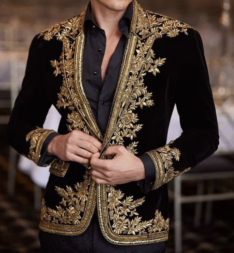 [Having gone back &amp; forth for weeks about a costume, Ambrose finally settled on Oberon from A Midsummer Night’s Dream. Dressed in gold and black and donning a masquerade mask, he sought out <a href="/EndearingEmmy/">Emylia Alexander | ᴘᴀʀᴏᴅʏ</a> so they might begin the festivities that people were already gathered for.]