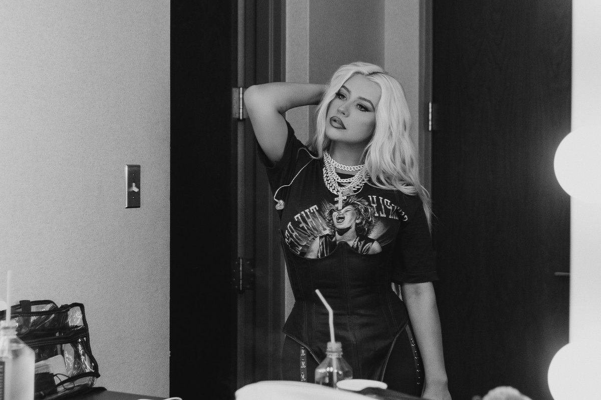 xtina's tweet photo. It was an honor celebrating the iconic Tina Turner at the Rock &amp; Roll Hall Of Fame last night!! ❤️ Congratulations to all of the 2021 inductees on your incredible achievements 💋 https://t.co/xE151EOEPI
