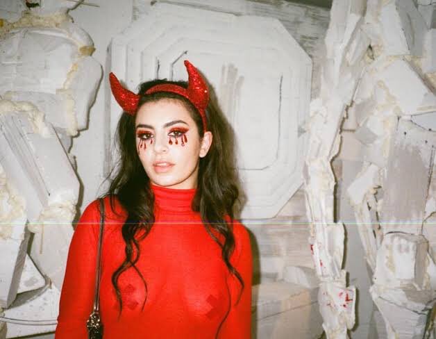 skyferrori's tweet photo. charli xcx as a devil is my favorite halloween costume https://t.co/ST59N03L9W