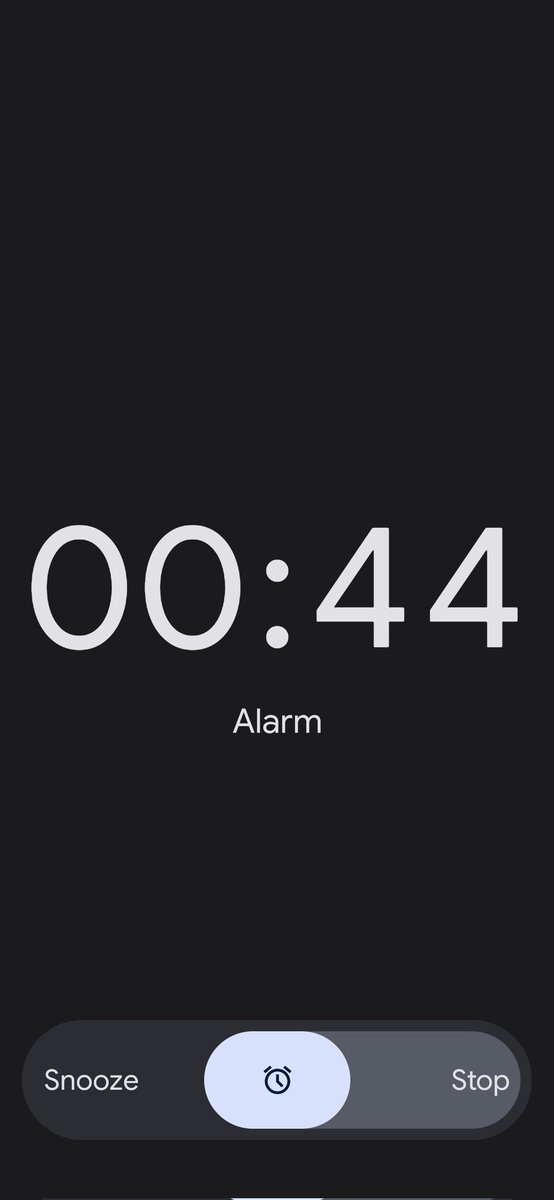 raji_btw's tweet photo. How's nobody talking about the alarm clock in the new update? Being used to swiping left anywhere on the screen to snooze, this is a real struggle every morning. #Android12 https://t.co/2PNY1aEZOu
