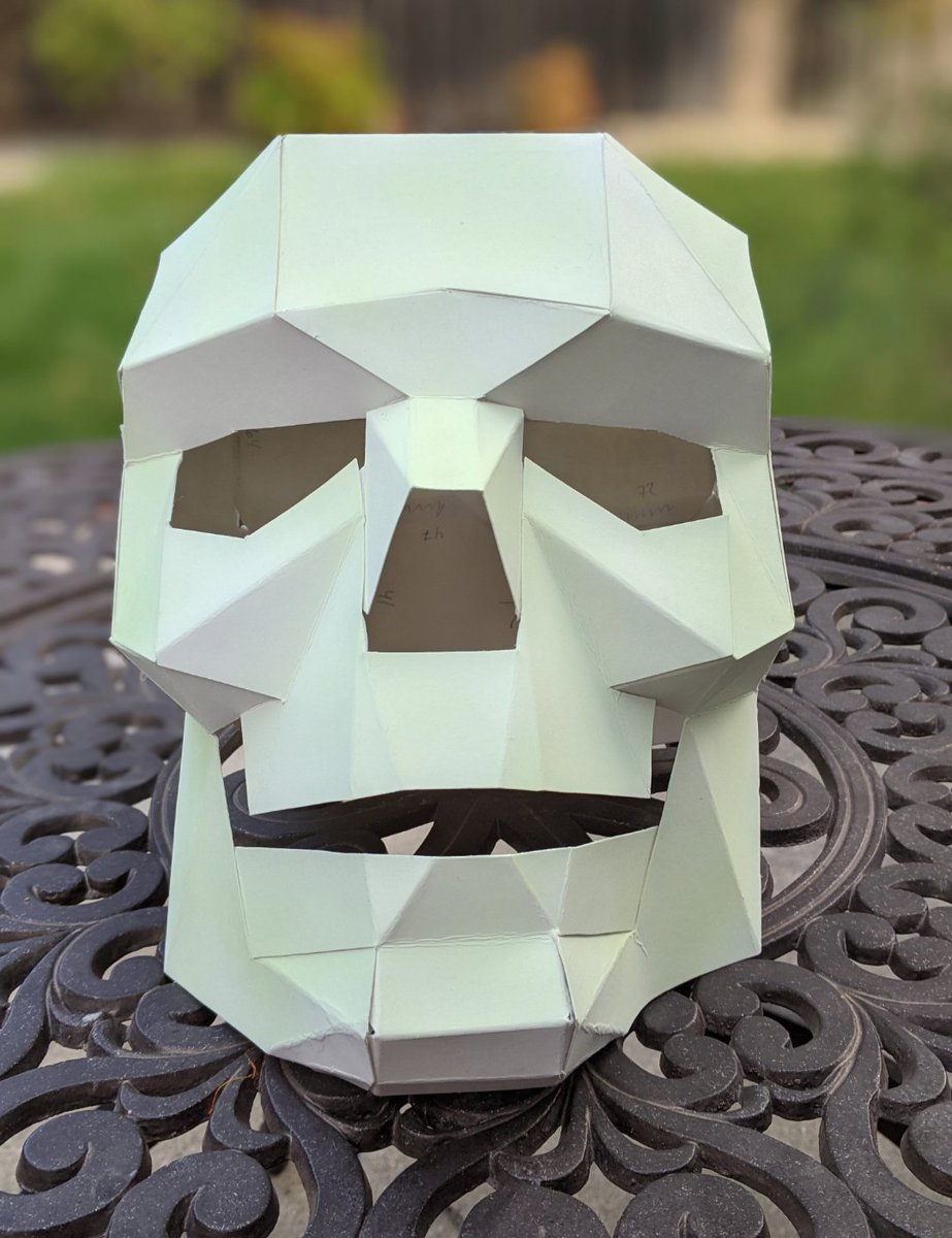 cyglor's tweet photo. Low poly skeleton mask made from pattern a few years ago. Still amazing + worth the effort. Happy Halloween! https://t.co/Evse1YQBqt