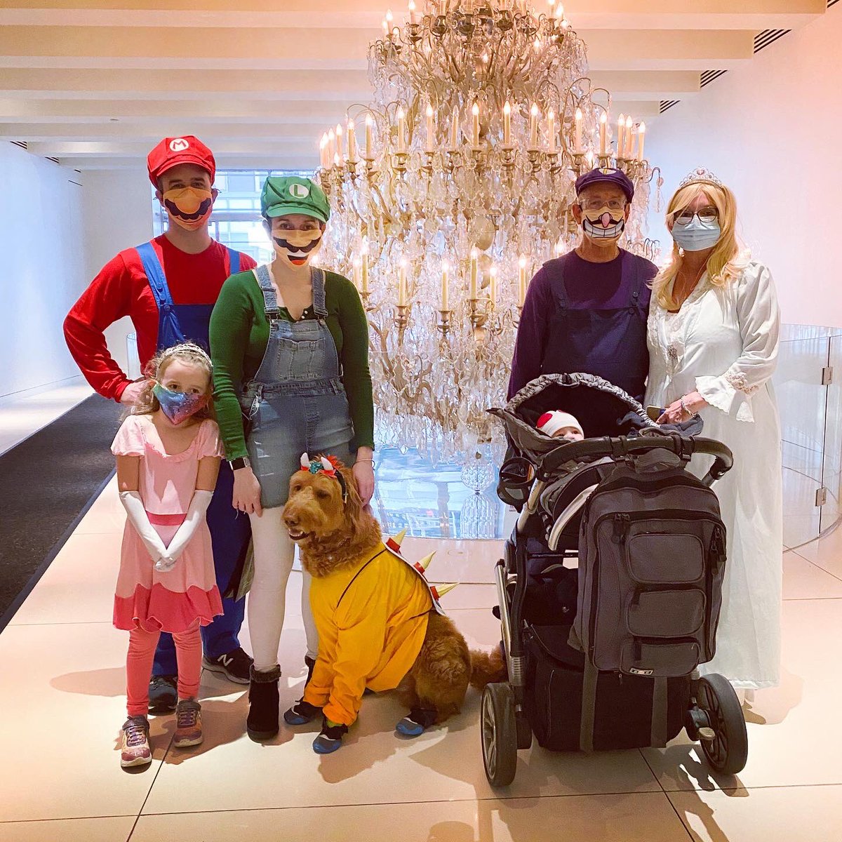 MorChuck21's tweet photo. #HappyHalloween, sorry 4 the radio silence, but Mom went all out this year. Hope u have a wonderful &amp; safe holiday, &amp; don’t 4get 2 cover 4 all that 🍭🍬! What did u dress up as? Share in the comments. #morchuck21 #itsameMario #nintendo #nychalloween #makingepicmemories #dogs https://t.co/BzLfsUZss6