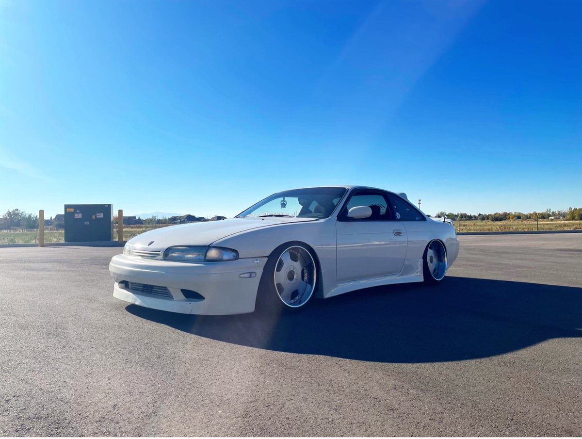 MaxKelson1's tweet photo. I found my dream car recently, a rare 1996 Nissan 240sx /s14. This car has a full Japanese skyline drivetrain swapped and a big turbo plus authentic Japanese 3-piece wheels from the 90's. This car has been a lot of work, but worth it. #Nissan240sx #UVUCOMM3140 #CarModifications https://t.co/0EqBEnDARB