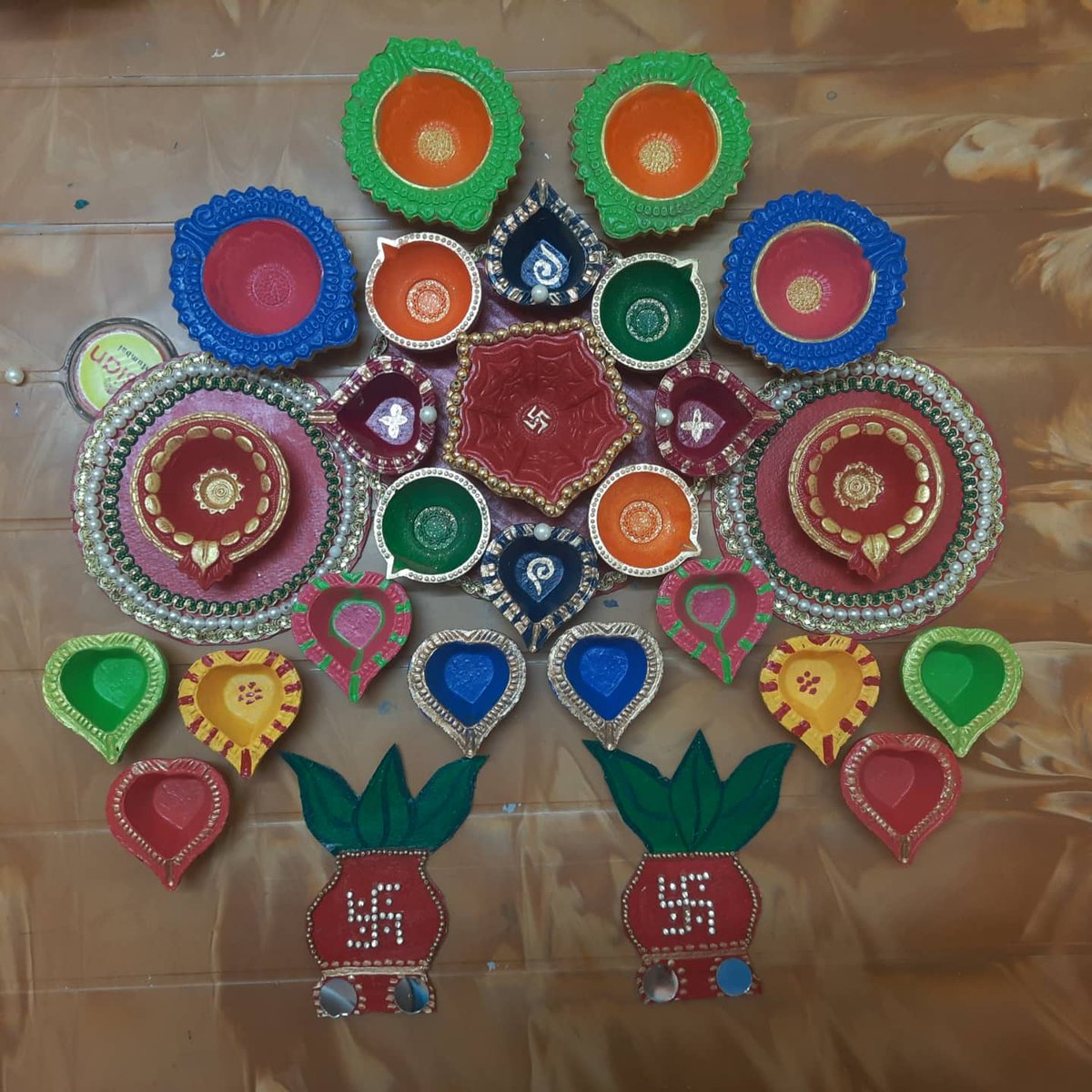 HarshankL's tweet photo. DIY diyas all ready for diwali🪔 https://t.co/ypAcA4dWAK