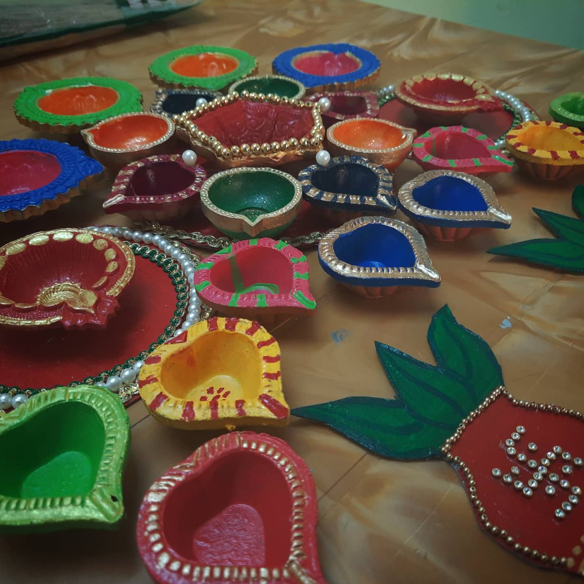 HarshankL's tweet photo. DIY diyas all ready for diwali🪔 https://t.co/ypAcA4dWAK