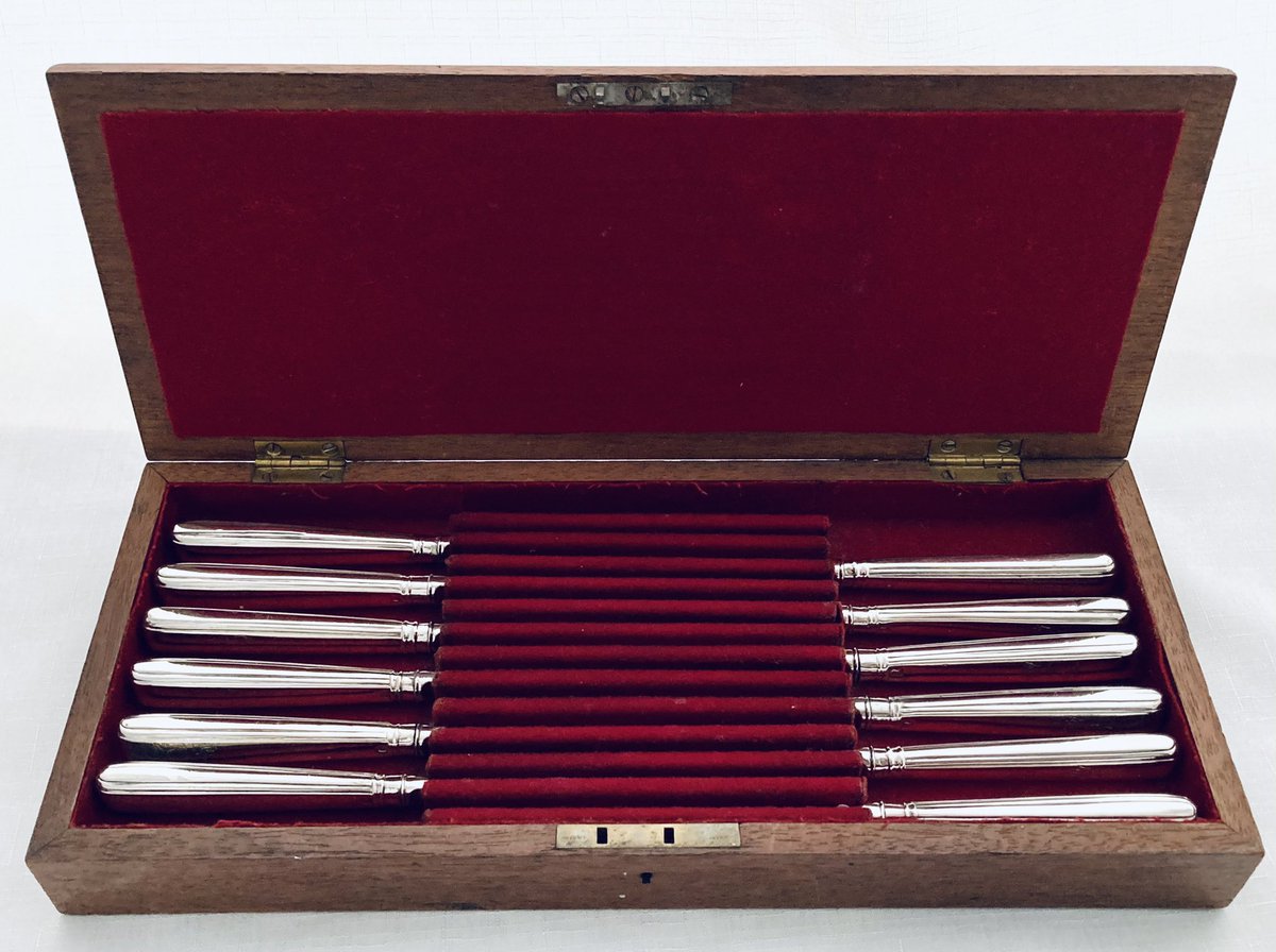BassetlawA's tweet photo. A George IV cased set of twelve Irish silver fruit knives. Each is crested for Richard Trench, 2nd Earl of Clancarty. Hallmarked for Dublin 1826 by Stephen Bergin. #Irishsilver #Clancarty #Georgian #antiques #Heusden https://t.co/mB6DX2d5tE
