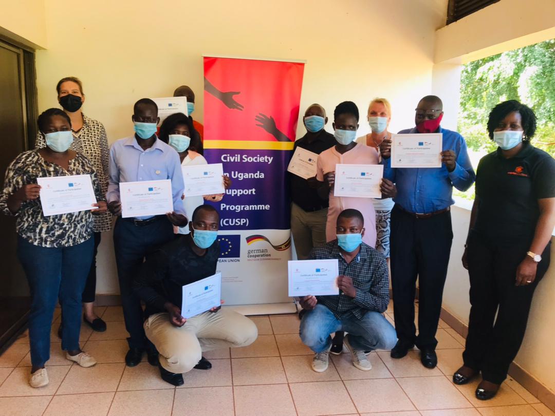 giz_uganda's tweet photo. Participants from TECOMA receive certificates after completing a training cycle on Social Business and Marketing. The training cycle was conducted by @Capitalsolns in Kumi District with support from GIZ CUSP. GIZ CUSP is funded by @EUinUganda &amp; @BMZ_Bund https://t.co/LEf0Qpbqa3
