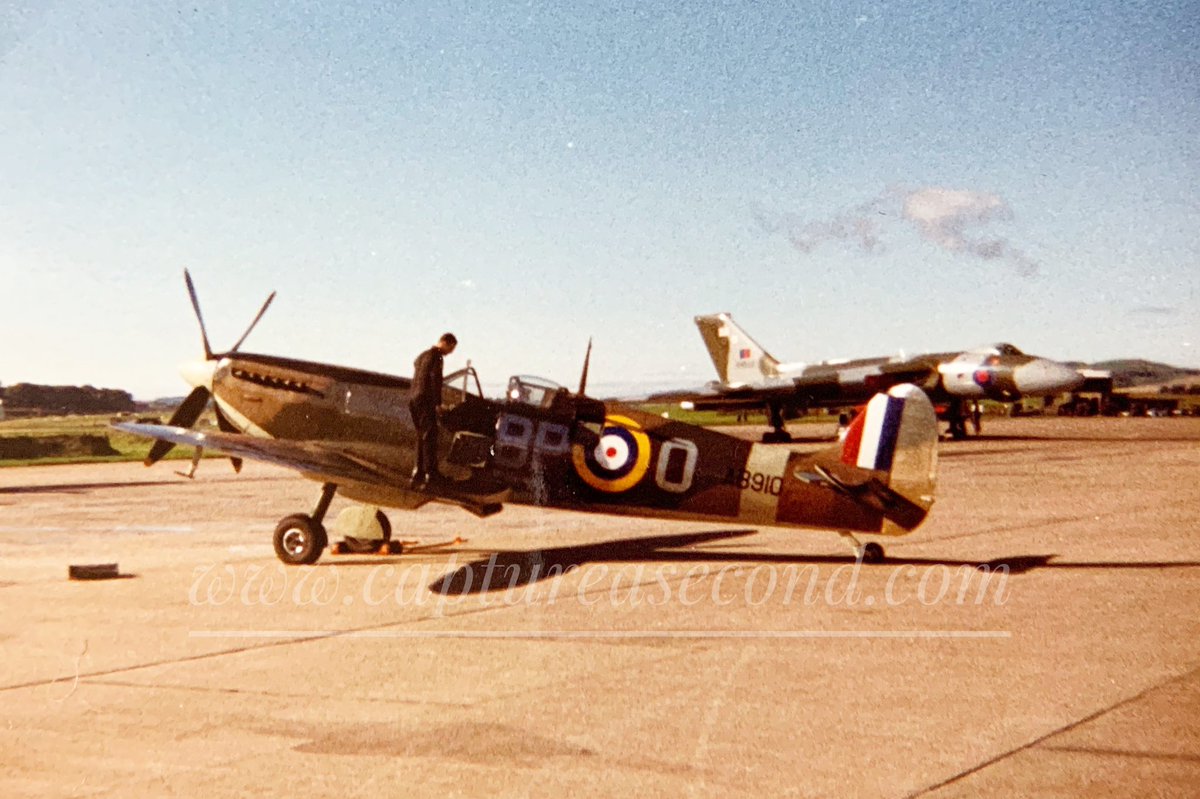 captureasecond's tweet photo. Which would you like to fly? @RAFBBMF Spitfire AB910 or @vulcantothesky Vulcan XH558? RAF Leuchars, late 1980s. #bbmf #spitfire #ab910 #royalairforce #raf #vulcan #xh558 #camo #triangle #jet #aircraft #aeroplane #noordinaryjob #aviation #avgeek #captureasecond https://t.co/BLOF5VQIAg