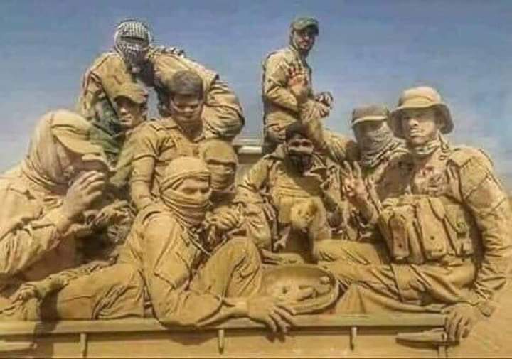 b_313r's tweet photo. صوره لابطال الحشد المقدس 
يجب استبدال نصب الحريه بهاذه الصوره https://t.co/R9dNAkhU0p