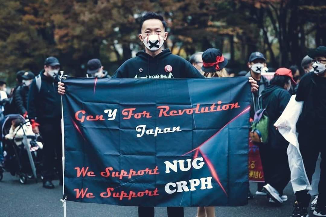 Chanapai247's tweet photo. Even under the rain , Burmese community in #Tokyo of Japan completed #BloodyMoneyMyanmar campaign movement calling on @TotalEnergies , @Chevron and #POSCO to end up payments to SAC .

MYANMAR NEEDS HELP
#Nov1Coup
#WhatsHappeningInMyanmar https://t.co/XjqIgRDJ3A