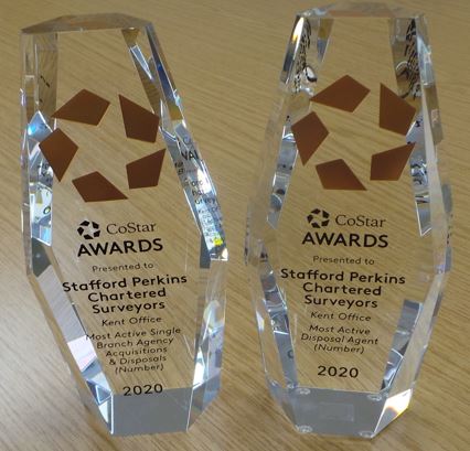 SP_Ashford's tweet photo. We were mystified on Friday when an unexpected parcel arrived - not a 5th Anniversary present but our two #CoStar awards - for the most active disposal agent in Kent (number of units) and the most active single branch (Kent). Here's to winning a few more! https://t.co/xYnwseGipT