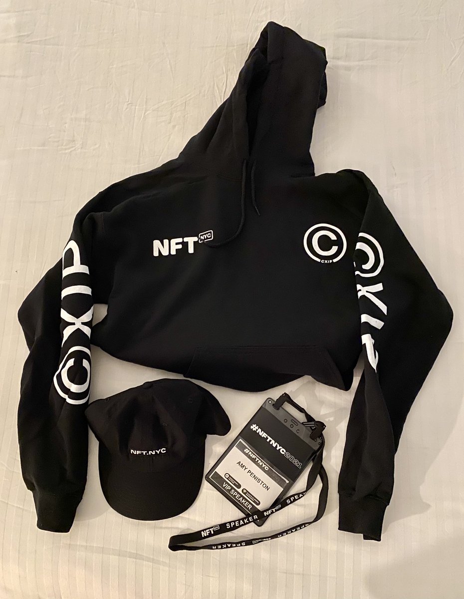 Registration complete &amp; it’s official - crypto has taken over Margaritaville Times Square. The fake palm trees kill me. 😂

Oh, and look at this sweet #NFTNYC2021 swag! 😍
