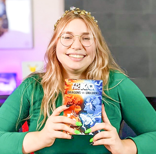 UnstableGamesHQ's tweet photo. We love the tiara, we love the nails, and we DEFINITELY love the game! Thanks @brokenthesealis! 💚 🖤
_________________________
#unstableunicorns #TTKO #TicTacKO #tabletopgaming https://t.co/AA287VZrrd